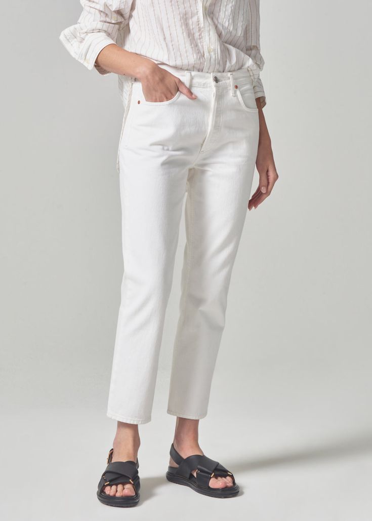 Designed to fit like your perfect vintage pair. The Charlotte sits high on the waist into a classic straight leg silhouette. This fit is true to size. Looks Like: Cool crisp white with finished hems Feels Like: Heavyweight yet breathable non-stretch rigid cotton with an authentic vintage hand From our HUMANITY Collection Classic Straight Hem Jeans For Summer, Classic Cropped Leg Jeans For Summer, Classic Straight Fit Jeans For Summer, Elegant Spring Pants With Standard Cut Leg, High Rise Straight Fit White Jeans, Classic White Straight Fit Jeans, White Straight Bottoms For Workwear, White Straight Hem Bottoms For Fall, White Straight Bottoms For Fall