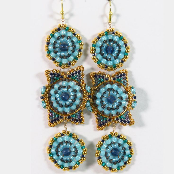 Beautiful Dangly Hand Beaded Earrings In 24k Gold, Blue And Blue-Green Glass. Handmade By Me In The Miguel Ases Style. Length: 3" Width: 7/8" Artisan Blue Jewelry With Gold Beads, Handmade Blue Chandelier Earrings, Elegant Turquoise Beaded Earrings With Gold Beads, Elegant Blue Chandelier Earrings With Colorful Beads, Blue Bead Cap Drop Earrings, Blue Beaded Drop Earrings With Bead Caps, Artisan Blue Earrings With Dangling Beads, Blue Dangle Jewelry With Bead Caps, Artisan Blue Beaded Earrings