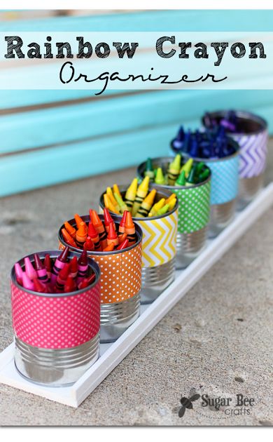 rainbow crayons are in tins on a tray with the words rainbow crayon