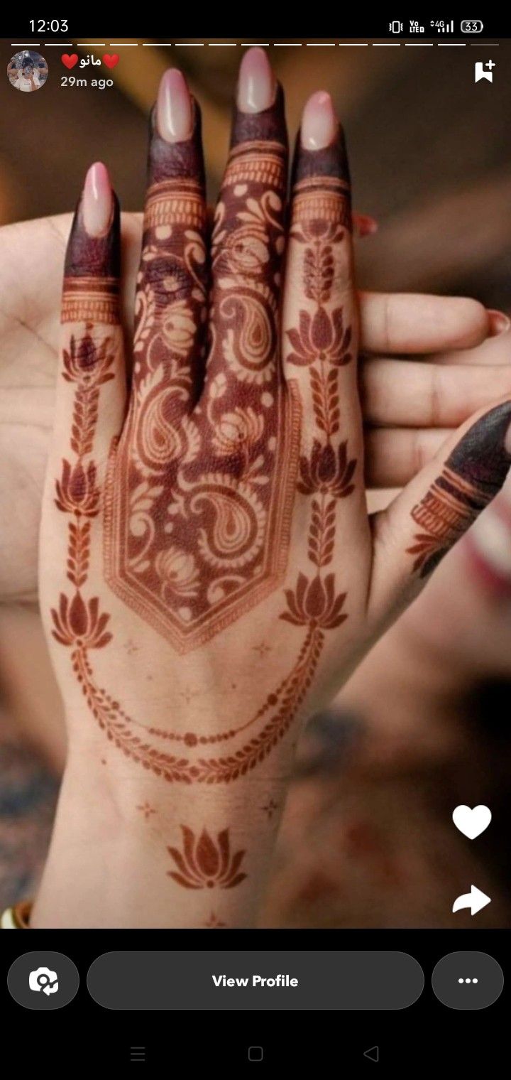 a woman's hand with henna on it and the words, i love you