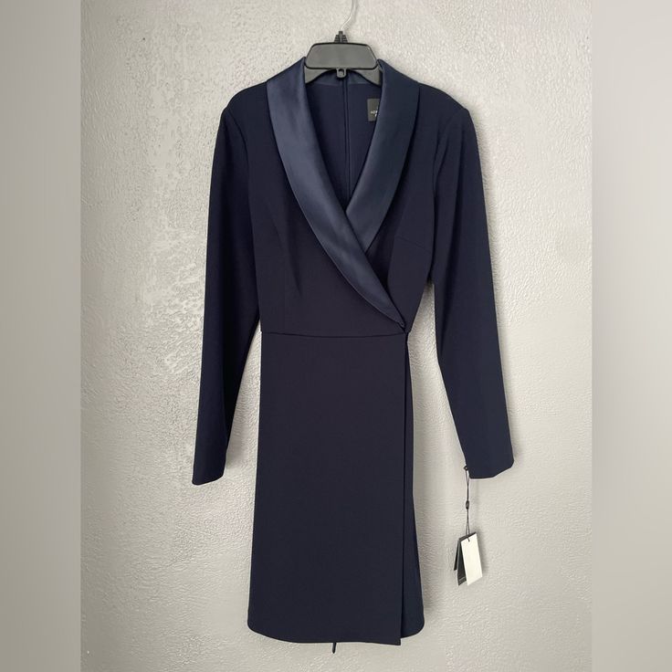 Navy Blue Long Sleeve Dinner Dress Navy Long Sleeve Midi Dress For Formal Occasions, Formal Navy V-neck Midi Dress, Elegant Blue Midi Dress For Semi-formal Occasions, Navy Dress For Fall Party, Elegant Blue Lined Midi Dress, Formal Blue Long Sleeve Midi Dress, Elegant Lined Blue Dresses, Formal Navy Midi Dress V-neck, Formal Fitted Navy Mini Dress