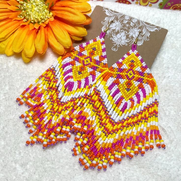 New! Artisan Handmade! Hand Beaded Large Southwest Style Fringe Earrings Long Large Lush & Lovely! Chevron Fringe Design! Spring & Summer Vacation Vibe In A Stunning Color Palate! Pink Orange Yellow White Mix All Hand Beaded In Our Boutique! Double The Fringe Of Most Earrings! Runway High-End Boutique! Absolutely Stunning! Perfect For Party, Date Night, Career, Vacation Or Cruise! Lots Of Beads & Numerous Hours Went Into These Handcrafted Beauties! Lovely "One Of A Kind" Design Don't Let Them Sl Pink Artisan Beaded Jewelry, Artisan Orange Beaded Earrings, Traditional Multicolor Jewelry With Beaded Fringe, Traditional Yellow Handwoven Beaded Earrings, Traditional Pink Jewelry With Tiny Beads, Yellow Handwoven Beaded Earrings For Festivals, Festival Yellow Handwoven Beaded Earrings, Handwoven Pink Jewelry For Summer, Traditional Yellow Beaded Earrings With Tiny Beads