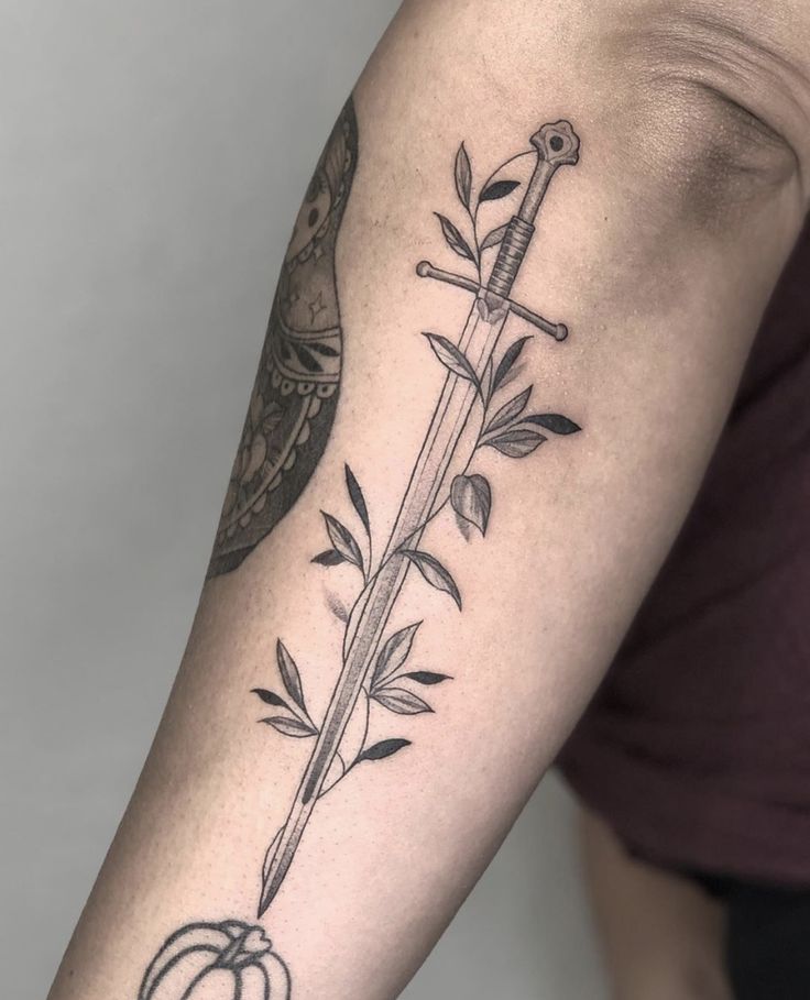 Where There's A Will There's A Way Tattoo, Three Of Swords Tattoo Fine Line, Spine Tattoos For Women Swords, Broadsword Tattoo, Feminine Knife Tattoo, Dagger With Vines Tattoo, Elongated Tattoo, Vertical Arm Tattoo, Swords Chest Tattoo