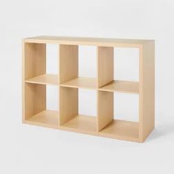 a wooden shelf with four shelves on each side