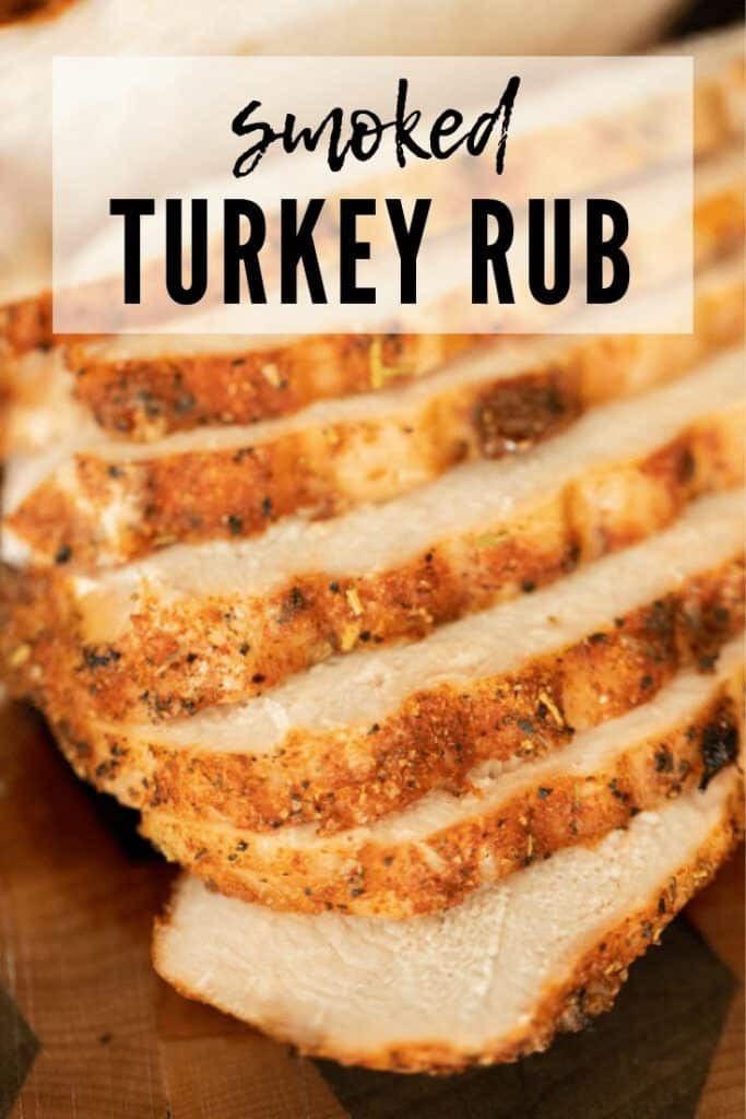 sliced turkey rub on a cutting board with text overlay that reads smoked turkey rub