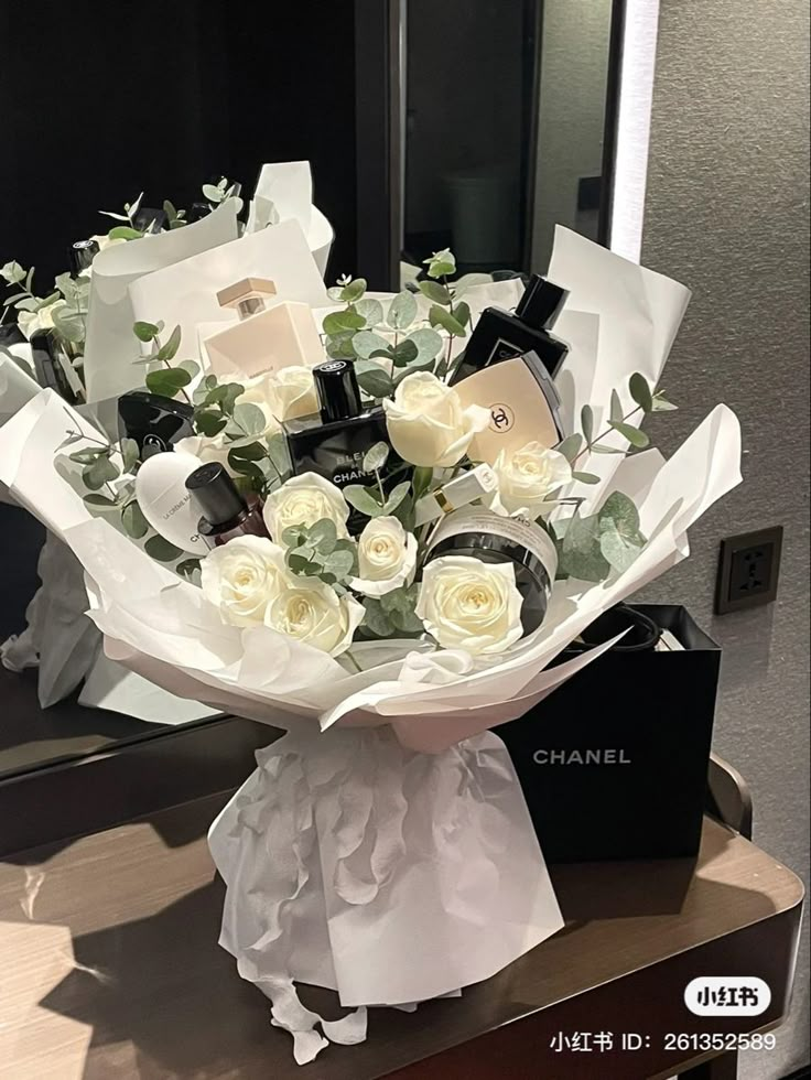 a bouquet of flowers sitting on top of a counter