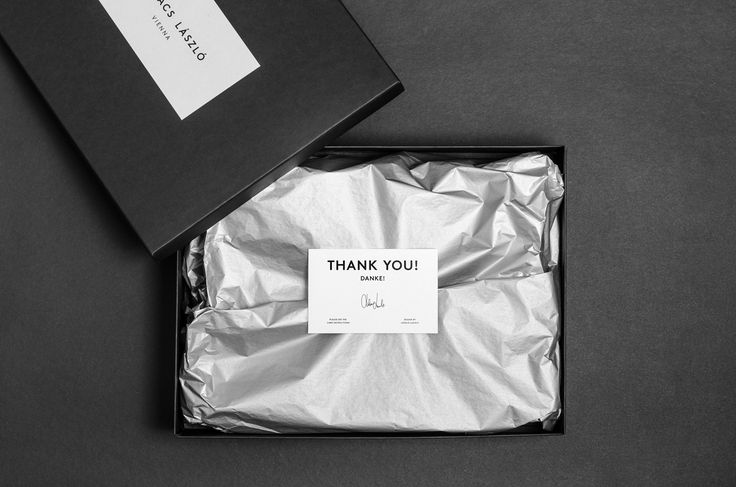 an open box with a thank you note on it