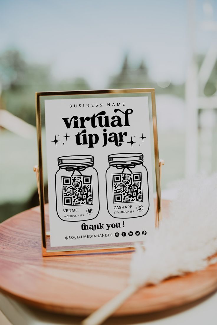 a wooden table topped with a sign that says virtual up jar