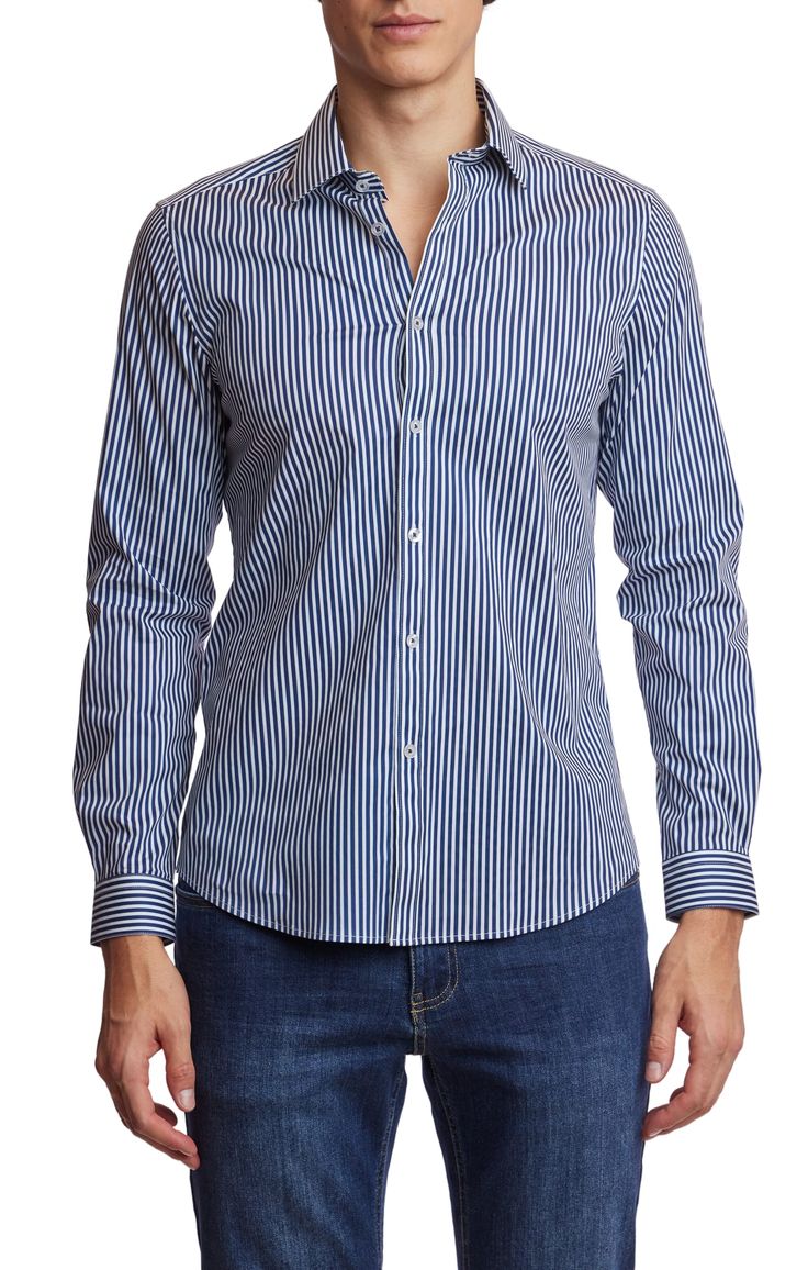 A classic slim spread collar shirt with navy stripes. The cotton stretch blend offers comfort all year round and can be worn with a wide range of clothing. PRODUCT DETAILS: style 6513W slim fit dress shirt spread collar printed fabric cotton stretch blend dry clean only imported Striped Cotton Dress Shirt For Semi-formal Occasions, Striped Cotton Shirt For Semi-formal Occasions, Semi-formal Striped Collared Shirt, Pinstripe Dress Shirt With Striped Collar In Cotton, Pinstripe Dress Shirt With Striped Collar, Pinstripe Shirt With Striped Collar, Pinstripe Cotton Dress Shirt With Striped Collar, Classic Navy Cotton Dress Shirt, Fitted Dress Shirt With Striped Spread Collar