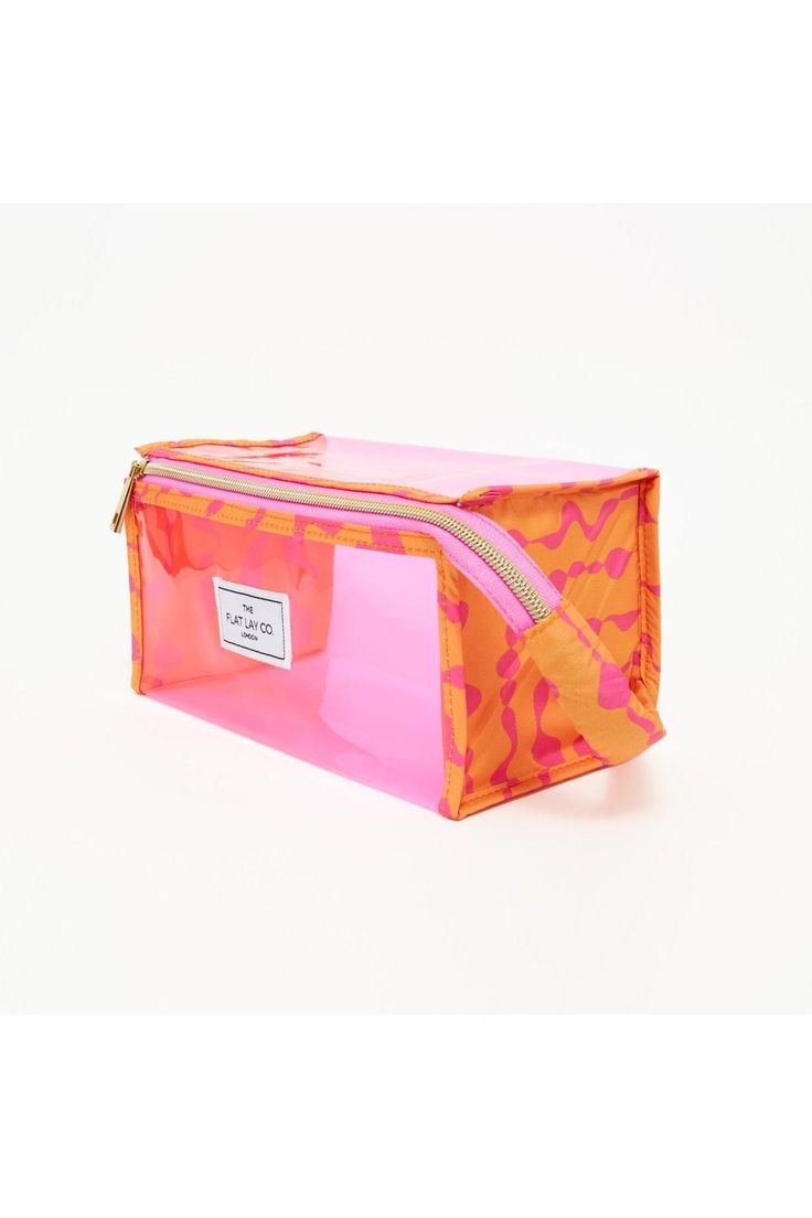 Orange in Pink Dribbles Jelly Open Flat Box from The Flat Lay. Keep your makeup products and cosmetics always looking their best and use this must-have makeup bag this season. Versatile and super stylish, this beauty bag, when closed, looks great on your makeup table, and can also be displayed with other box bags for the perfect makeup storage solution. Jelly Makeup, Makeup Storage Solutions, Box Bags, Makeup Table, Oasis Fashion, Pierced Jewelry, Body Makeup, Orange Bag, Perfect Makeup