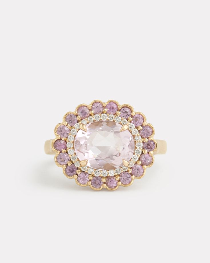 18K Yellow Gold Pink Tourmaline and Diamond Edged Morganite Oval Ring, .14 TCWOrnament is 3/4 Inch x 1/2 Inch Style# YRSSOPMW Elegant Round Pink Sapphire Gemstones, Luxury Tourmaline Rings With Rose Cut Diamonds, Elegant Round Pink Sapphire Cluster Ring, Oval Yellow Gold Gemstones With Halo Setting, Elegant Multi-stone Pink Sapphire Diamond Ring, Yellow Gold Pink Sapphire Gemstone Ring, Elegant Multi-stone Pink Sapphire Rings, Elegant Pink Sapphire Rings With Halo, Pink Sapphire Cluster Ring With Gemstone