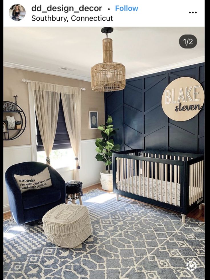 an image of a baby's room with blue walls and rugs on the floor