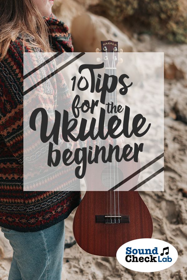 a woman holding an ukulele with the words 10 tips for the ukulele beginner