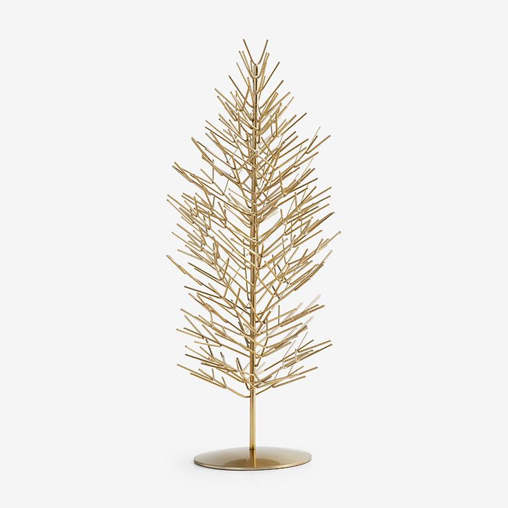 a gold christmas tree on a white background