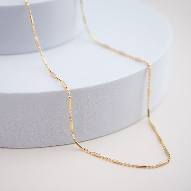 the namesake of our shape of you collection, this necklace embodies the concept behind the collection: taking it back to basics with simple, everyday, elevated pieces. 18kt gold BR gold filled available in 16" or 18" in length Gold Clavicle Chain Station Necklace For Everyday, Minimalist Everyday Bar Necklace With Delicate Chain, Everyday Minimalist Station Necklace With Delicate Chain, Dainty 14k Gold Filled Necklace For Everyday, Minimalist 14k Gold Filled Charm Necklaces For Everyday, Everyday Delicate Chain Necklace In Recycled Gold, Everyday Minimalist 14k Gold Filled Charm Necklaces, Minimalist 14k Gold Filled Yellow Gold Necklace, Everyday 14k Gold Bar Necklace With Adjustable Chain