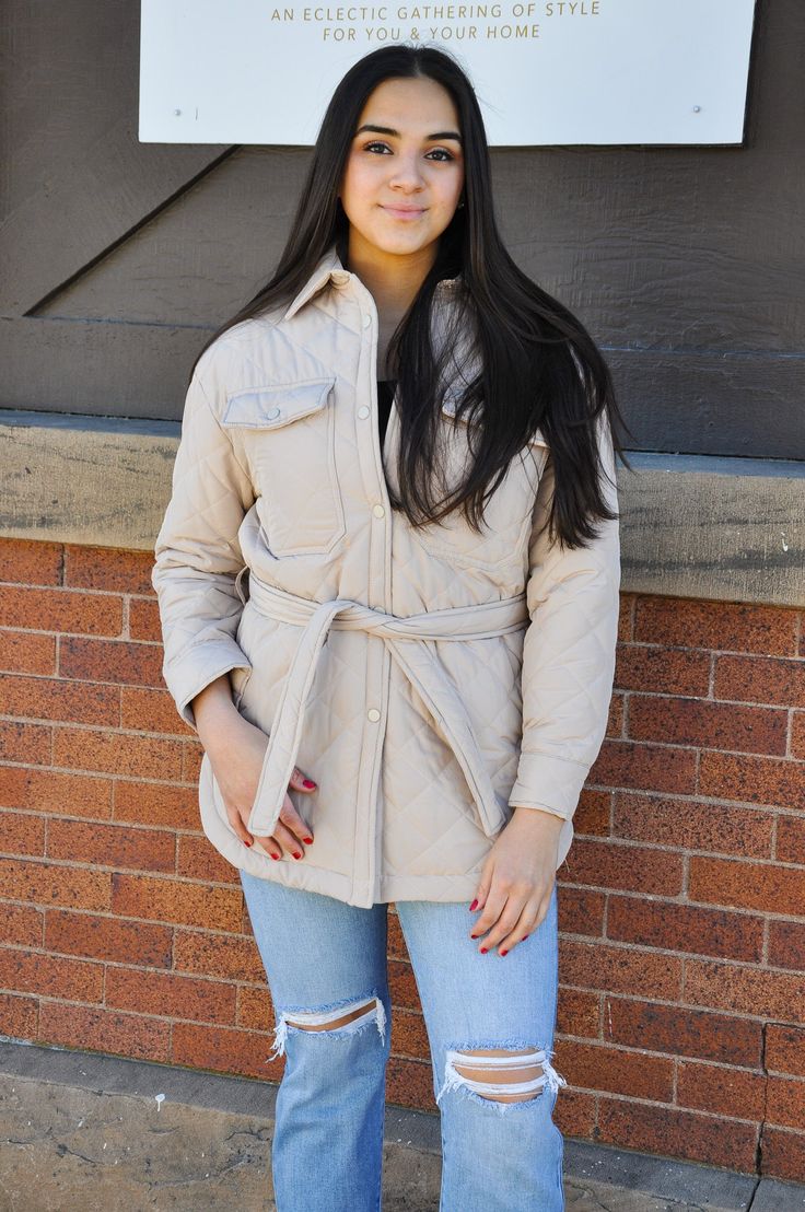 Elevate your style while staying warm and comfortable with our Lightweight Quilted Snap Button Jacket. Whether you're heading out for a walk, meeting friends, or simply need a stylish layer to complete your outfit, this jacket is the perfect choice. Make a statement with this versatile and functional jacket that combines timeless design with modern comfort. Elevate your fashion game and stay cozy in style. Quilted Button-up Winter Outerwear, Casual Long Sleeve Quilted Jacket, Cotton Button-up Outerwear For Day Out, Casual Quilted Outerwear, Beige Cotton Outerwear For Cold Weather, Casual Quilted Outerwear For Everyday, Everyday Winter Quilted Jacket With Pockets, Spring Cotton Quilted Jacket For Cold Weather, Single Breasted Cotton Winter Outerwear