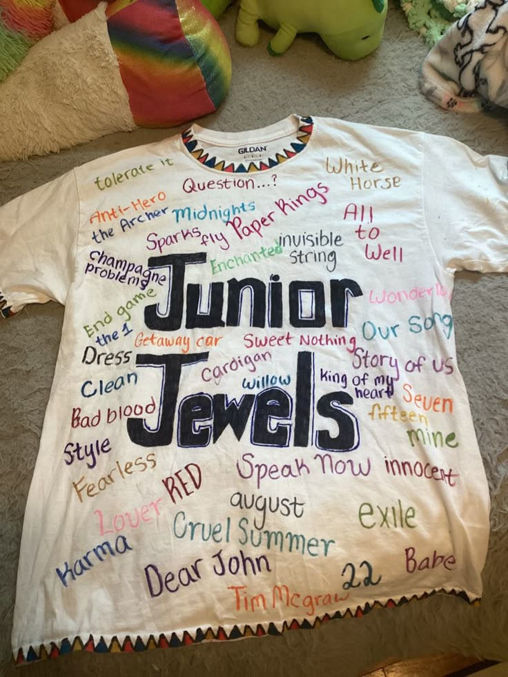 a t - shirt with the words junior jewels written all over it