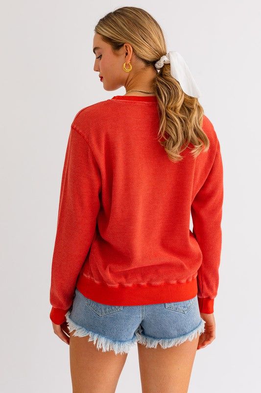 Spread some cozy patriotic vibes with our adorable USA Thermal Sweatshirt in red! Round Neck Fabric: 65% Polyester + 35% Cotton Model is wearing a size Small Party Bottoms, Resort Chic, Crop Top Sweater, Dresses By Length, Vacation Dresses, Vest Top, Sweater And Shorts, Top Trends, Hat Hairstyles