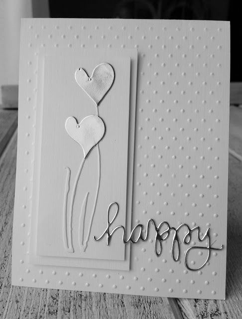 a card that says happy with two hearts and the word happy on it in black and white