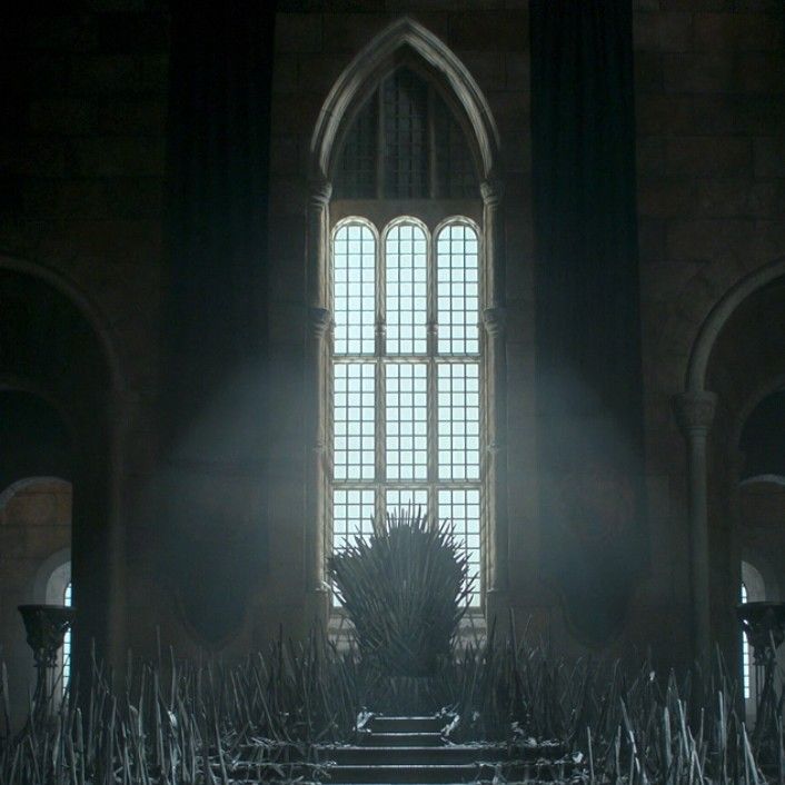 the iron throne sits in front of a window