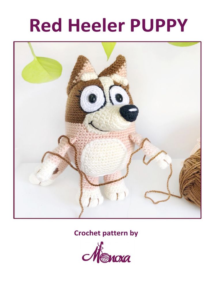 a crochet pattern for a red heeler puppy with glasses and a sweater