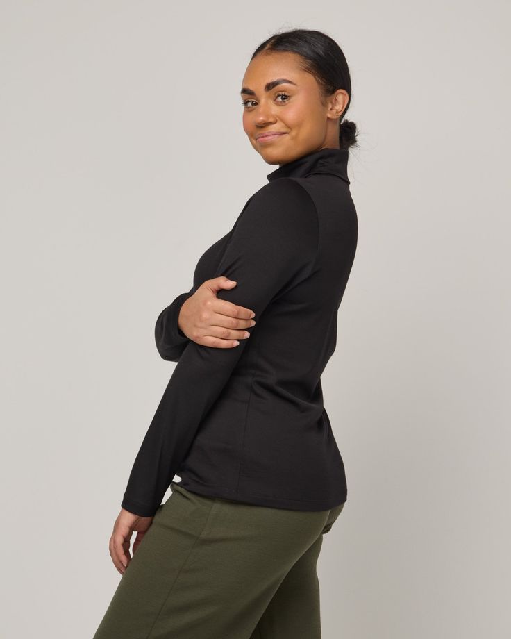 A long sleeve turtleneck that wears close to the body. Neck can be folded in half, or scrunched down to create a ruched look. Sizing Tip: The Addison Turtleneck is slim fit. Fits close to the body but is not tight. Hugs in all the right places for optimal layering. Styled on Gracey with the Frame Ponte Culotte. Turtleneck Top, Wool Turtleneck, Live Simply, Long Sleeve Turtleneck, Turtle Neck Top, Fun Things To Do, Layering, Turtle Neck, Slim Fit