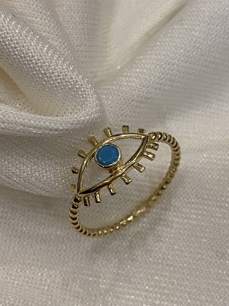 "ABOUT PRODUCT This 14K Gold Evil Eye Ring is beautifully designed and hand crafted with our associates to make this a special gift for your loved ones. Knowing the value of our customers, We prepare each piece with extra care and attention. ITEM DETAILS Material: 14K Gold Approx: 1.25 gram Available colors: Gold, Rose Gold, White Gold Available Sizes: 4 US to 11 US ✪ 14k Solid Gold ( Certification will be included with your order ) ✪Available 14K White, Yellow, Rose Gold (also in 10, 18K) 🛠 Ya Handmade 14k Gold Open Midi Rings, Handmade Yellow Gold Midi Rings, Blue Stackable Jewelry As Gift, Handmade Dainty Stackable Rings As Gift, Unique Blue 14k Gold Rings, Fine Jewelry Rings With Evil Eye For Gifts, Fine Jewelry Evil Eye Ring As Gift, Fine Jewelry Evil Eye Rings For Gifts, Evil Eye Ring Jewelry Gift