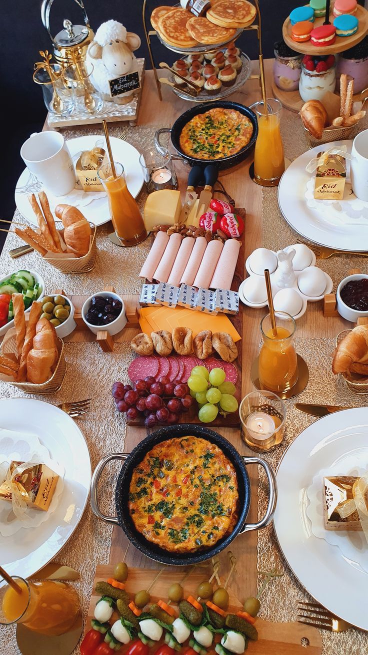 a table full of food and drinks on it