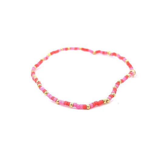 Discover the vibrant charm of our handmade Miyuki Beads Bracelet, featuring a stunning combination of colors. Crafted with care in Colombia, this adjustable bracelet is designed to fit comfortably on any wrist. The gold string adds a touch of elegance, making it a versatile piece for both everyday wear and special occasions. Embrace the spirit of adventure and let this bracelet become a cherished part of your jewelry collection, perfect for expressing your unique style. Material Type: Miyuki Bea Gold Heishi Beads Friendship Bracelet, Gold Heishi Beads Bracelets As Gift, Gold Heishi Beads Bracelet Gift, Adjustable Gold Bead Bracelet As Gift, Adjustable Gold Beads Bracelet As Gift, Pink Hand-strung Braided Bracelets As Gift, Gold Heishi Beads Bracelet With Colorful Beads, Adjustable Gold Beads Bracelet, Trendy Adjustable Friendship Bracelets With Gold Beads