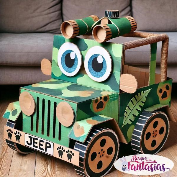 a cardboard jeep made to look like a camo truck with big eyes and ears