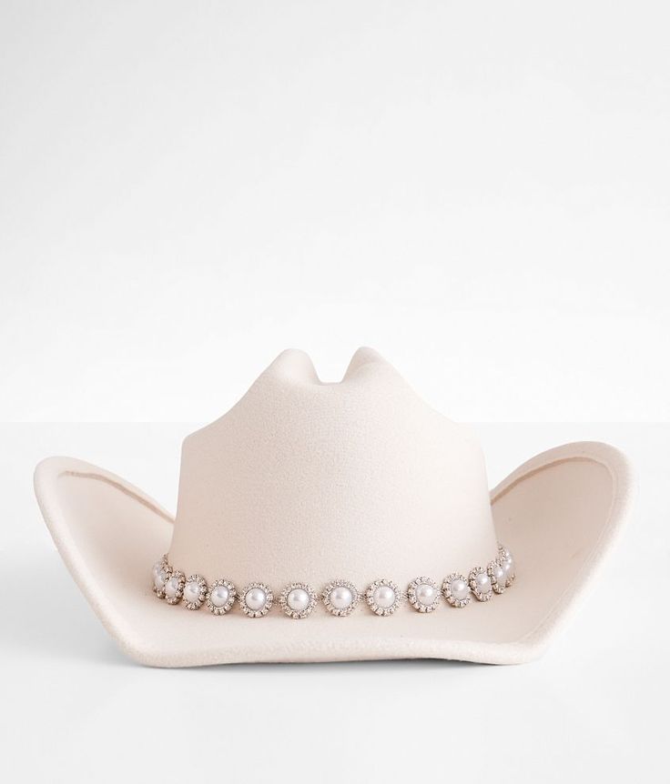 Fame Accessories Faux Pearl Cowboy Hat - Cream , Women's Ivory Glitz structured hat Interior cinch tie band 3 1/2 brim One size fits most. 90% Polyester 10% Alloy. Machine wash cold. Do not bleach. Do not tumble dry. Cool iron. Do not dry clean. Apparel & Accessories > Clothing Accessories > Hats Cream Cowgirl Hat, Cowgirl Hat Decor, Bride Cowgirl Hat Bachelorette, White Bedazzled Cowboy Hat, Pearl Cowboy Hat, Cowboy Concert Outfits For Women, Bling Cowboy Hat, Cowboy Hat Accessories, Women’s Cowboy Hats