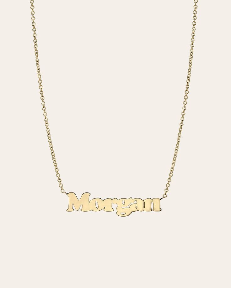 Classic and timeless 14k solid gold ID name necklace in our chic block font, with your choice of upper or lower case, hanging from a dainty chain with the length of your choice. Please enter up to 10 characters in the text field, for a heart symbol please enter ''(heart)''. Please note that the personalization box is case sensitive, so type in exactly how you would like your name to appear, with the correct upper/lowercase font. If you are interested in an ID necklace with more than 10 character Everyday Nameplate Necklaces With Names, Mother's Day Yellow Gold Initials Name Necklace, Custom 14k Gold Nameplate Necklace, Classic 14k Gold Custom Necklace, Customizable Everyday Nameplate Necklace, Everyday Customizable Nameplate Necklace, 14k Gold Name Necklace With Initial Pendant, Everyday Nameplate Necklace With Names, Personalized 14k Gold Necklace With Names