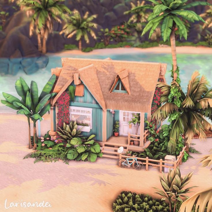 a house on the beach surrounded by palm trees