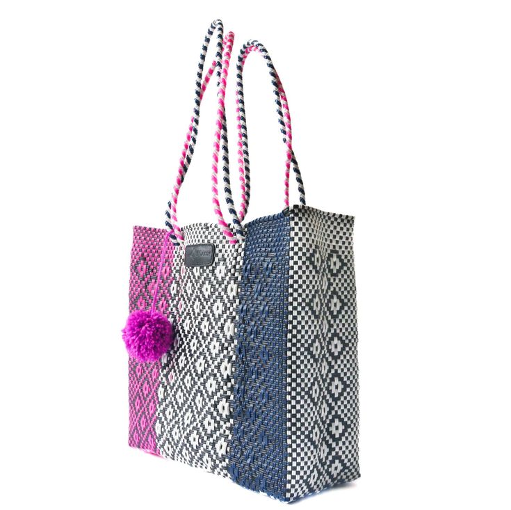 Being 100% handcrafted by artisans in Mexico, the Bloom Woven Tote Bag is stylish, lightweight, and eco-friendly. Crafted from ethically sourced high-quality materials, this bag is your picture-perfect companion for every occasion and will turn out to be your favorite accessory for years to come. The gorgeous design, perfect size, and durable construction make it a must-have for every closet. Environment-friendly, elegant, and functional, it doesn’t get better than this! Our redesigned totes now Casual Travel Shoulder Bag Made Of Recycled Materials, Summer Travel Bags Made Of Recycled Materials, Casual Recyclable Shoulder Bag For Vacation, Summer Rectangular Bags Made Of Recycled Materials, Rectangular Shoulder Bag For Travel Made Of Recycled Materials, Casual Summer Bags Made From Recycled Materials, Rectangular Shoulder Bag Made From Recycled Materials For Travel, Rectangular Recycled Material Shoulder Bag For Travel, Recycled Material Rectangular Shoulder Bag For Travel