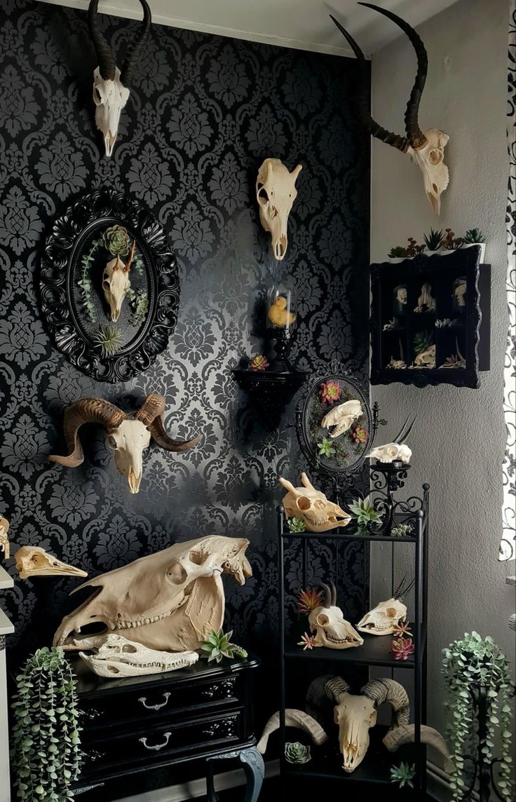 a room with skulls and deer heads on the wall, plants in vases next to it