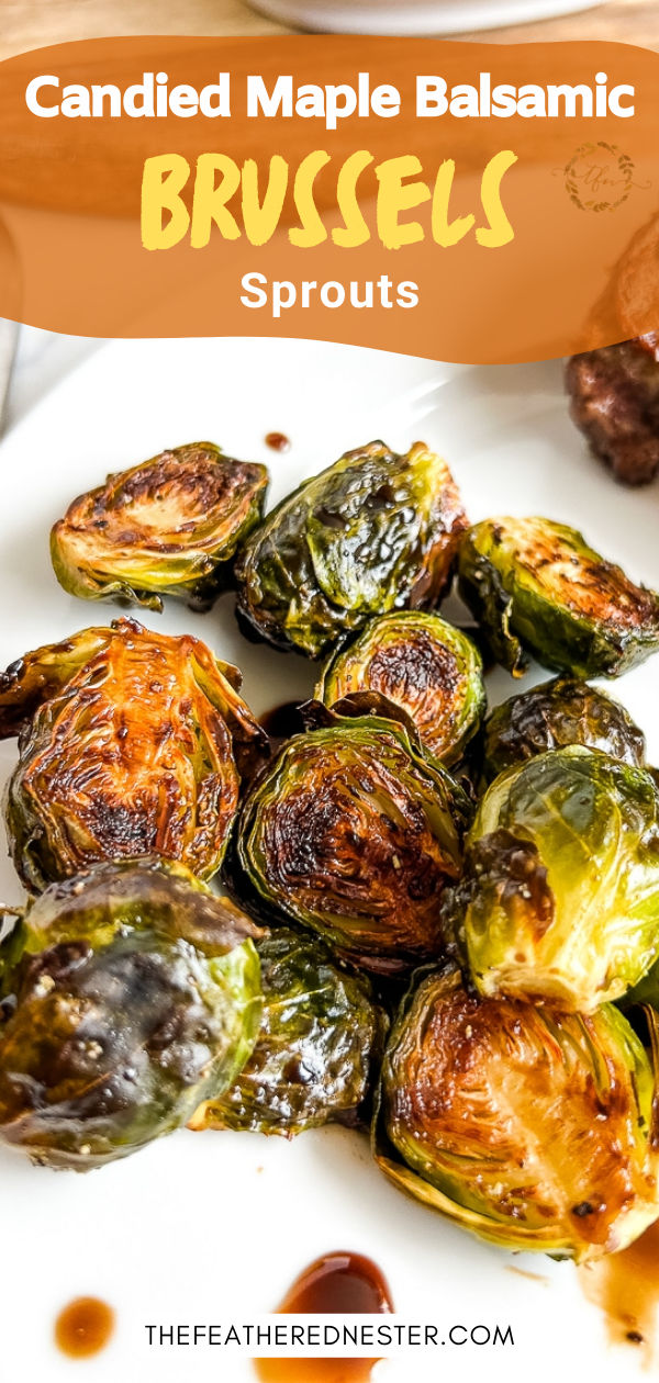 roasted brussel sprouts on a white plate with caramel sauce in the background