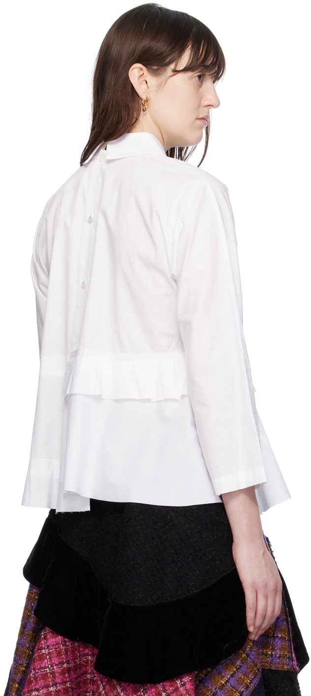 Cotton poplin blouse. · Peter Pan collar �· Raw edges at tiered peplum hem · Asymmetric hem · Button closure at back Supplier color: White White Peplum Tops, Tiered Blouse, Poplin Blouse, White Peplum, Layered Blouse, Blouse Price, Peplum Blouse, Peplum Hem, Hem Style