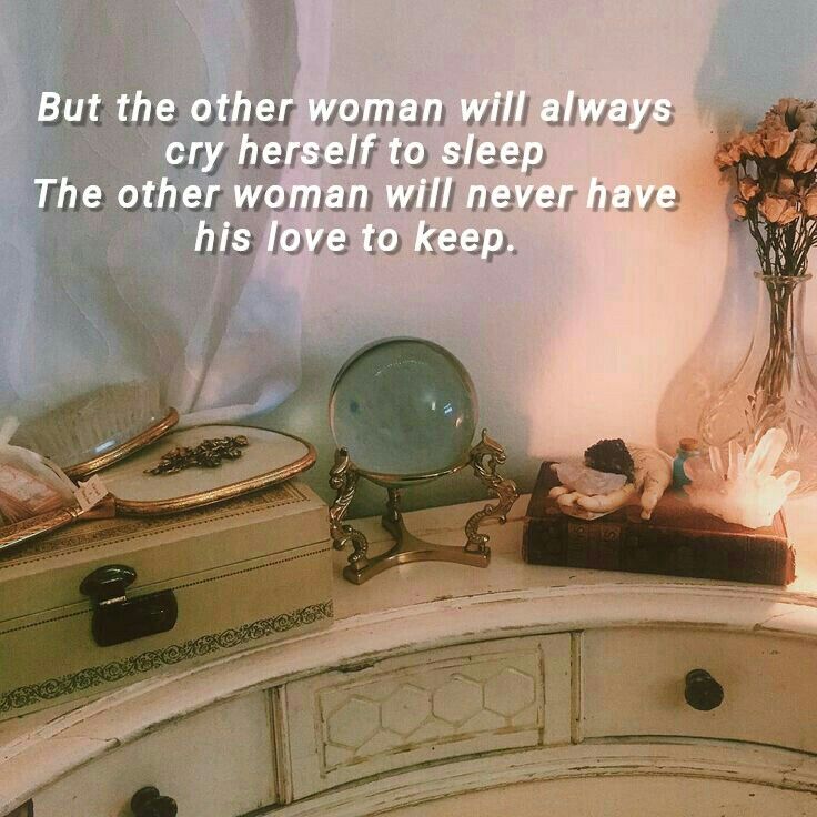 there is a dresser with flowers and other items on top of it, along with a quote about love to keep