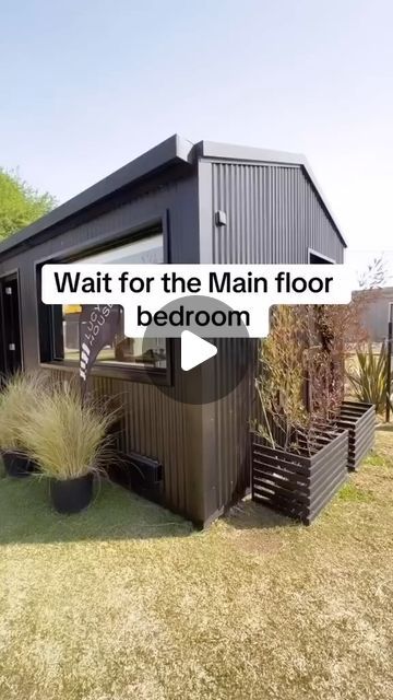 a small black house with the words wait for the main floor bedroom on it's side