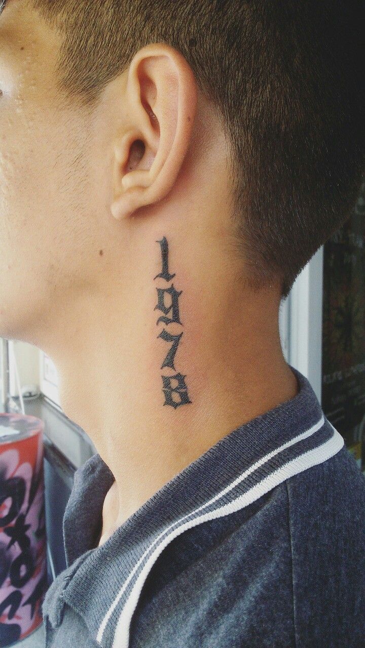 a man with a tattoo on his neck that says, i love you in chinese