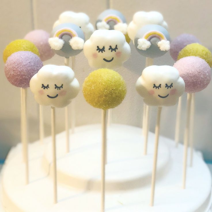 there are many cake pops with different designs on them