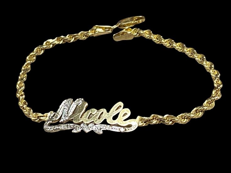 "Custom Solid 14K Yellow Gold \"Nicole\" Diamond Nameplate Rope Chain 7\" Bracelet! Bracelet is 14k Yellow gold and is in nice vintage condition! NICOLE Nameplate measures approximately 1 1/8\" long by 3/8\" wide! Solid 3mm rope chain bracelet Secure lobster clasp closure Total weight 7.4 grams! Shipped FAST and FREE, fully insured and in a gift box :)" Rope Chain, Name Plate, Chain Link Bracelet, Link Bracelets, Chain Bracelet, Chain Link, Lobster Clasp, Gold Bracelet, Jewelry Bracelets