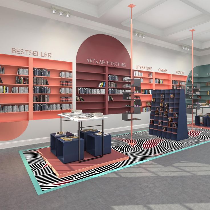 the interior of a book store with bookshelves and suitcases on the floor