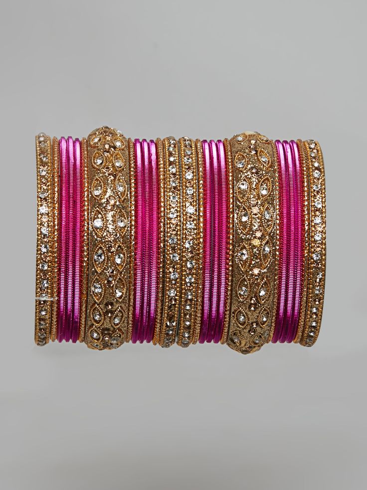 These fancy stone bangles are a perfect accessory for any of your Indian outfits Traditional Indian Jewelry:Slight Color variations are possible due to lighting and photography. If you are interested in purchasing this item and have any additional questions about this item, please feel free to email us at nazranaanj@gmail.com. For faster responses, call us at 732-283-1808 or WhatsApp us at 609-852-9922 Care instructionsKeep Jewelry away from direct heat, water, perfumes, deodorants and other str Traditional Adjustable Pink Bangle, Pink Bollywood Bracelets For Festivals, Elegant Pink Bangle For Festivals, Festive Pink Bangle For Festivals, Pink Bollywood Bangle For Festivals, Pink Hand-set Bangle Jewelry, Pink Bollywood Bracelets For Celebration, Traditional Pink Bangle For Party, Pink Bollywood Celebration Bracelets