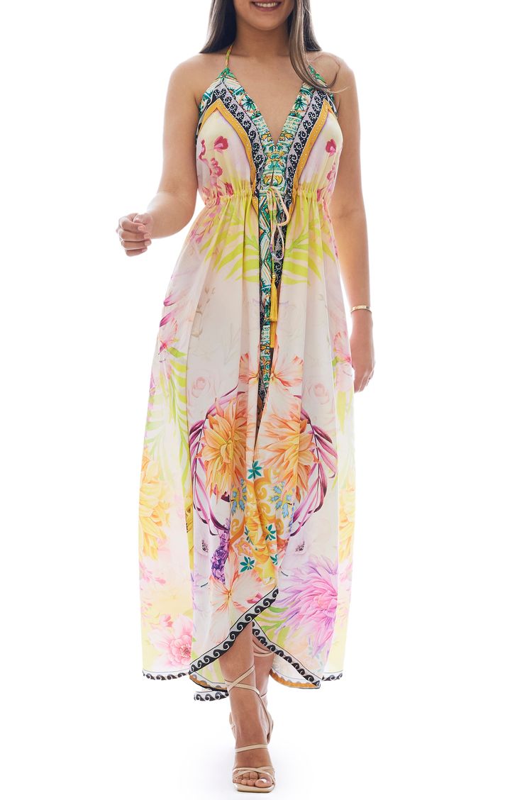 An intricate pattern with a bold palette adds eye-catching appeal to a cover-up dress crafted from lightweight fabric for easy movements. Halter neck Sleeveless 100% polyester Hand wash, dry flat Imported Model stats: 5'10" height, 32" bust, 25" waist, 36" hip. Sleeveless Printed Maxi Dress Beach Cover-up, Yellow Sleeveless Beach Cover-up Dress, Multicolor Print Sleeveless Dress For Beach Season, Sleeveless Vibrant Print Dress For Beach Season, Sleeveless Printed Tropical Beach Dress, Tropical Sleeveless Printed Beach Dress, Sleeveless Multicolor Beach Dress, Multicolor Printed Sundress For Beach Season, Orange Printed Sundress For Beach