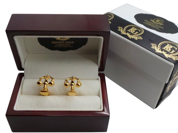 A stunning set of Legal Scales of Justice Cufflinks lavished in 24k Gold by THE BRITISH GOLD COMPANY Housed in the most stunning (double boxed) Cherry Wood, high gloss wooden gift case and ribbon-wrapped. LAW GOLD  CUFFLINK SET Very high quality set of cufflinks -  - A very nice weight, super detail and crafted to last indefinitely. Includes detailed hand signed and dated certificate pertaining to the gold plating. The certificate is presented in a gold envelope.  Presented in a beautiful, luxurious polished wood gift case. Please note: Due to supply issues, the style of the presentation box may vary, but it will always be high quality polished wood, double boxed and British Gold Company ribbon-wrapped. Shipped within 24 hours insured and tracked delivery to your door - PLEASE NOTE: Shippi Luxury Polished Gold Cufflinks, Luxury Gold Jewelry With Gift Box, Gold Polished Finish Cufflinks For Gift, Gold Hallmarked Cufflinks For Business, Gold Hallmarked Cufflinks For Formal Occasions, Classic Hallmarked Cufflinks As Gift, Classic Gold Jewelry With Gift Box, Gold Jewelry With Gift Box For Formal Occasions, Classic Gold Cufflinks For Anniversary