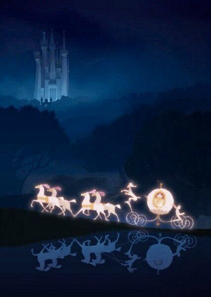 a group of people riding in a sleigh pulled by reindeers at night