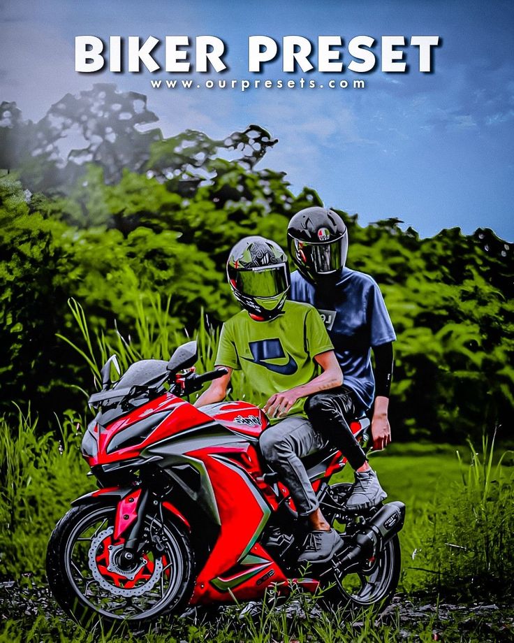 two people sitting on a red motorcycle in the grass