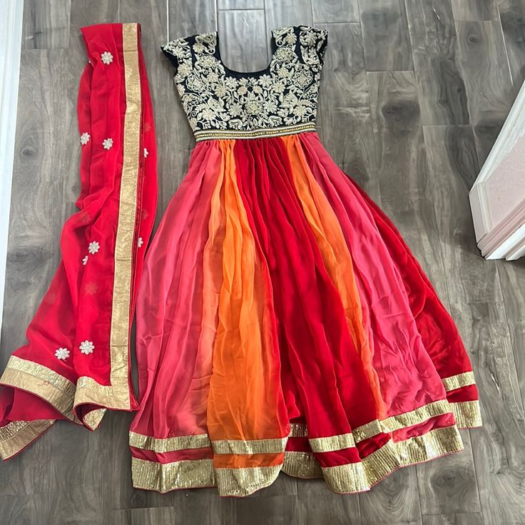 Multicolored Anarkali. Long Dress With Scarf (Dupatta) And Pants (Elastic Waist). Great Outfit For Birthday Parties, Bridal Showers, Engagement Parties, Wedding Reception, Etc.Really For All Occasions Red Bollywood Anarkali Set With Traditional Drape, Bollywood Red Anarkali Set With Dupatta, Bollywood Anarkali Set With Sheer Dupatta, Bollywood Style Designer Anarkali Set, Multicolor Anarkali Set For Eid, Bollywood Style Multicolor Georgette Anarkali Set, Multicolor Anarkali Churidar With Traditional Drape, Multicolor Anarkali Set For Diwali, Multicolor Maxi Anarkali Set With Resham Embroidery