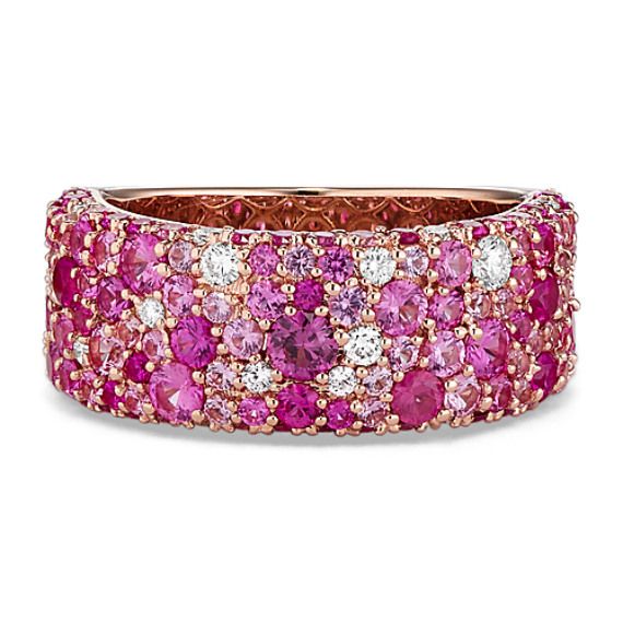 This beautiful ring features a monochromatic mosaic of natural pink sapphires dotted with natural diamond accents to create a bold pop of color. Its vivid 14-karat rose gold perfectly complements all the gemstones. Luxury Pink Ruby Ring With Diamond, Luxury Pink Ruby Diamond Ring, Luxury Pink Ruby Ring With Accent Stones, Luxury Pink Diamond Ring With Pink Sapphire, Luxury Pink Pink Sapphire Diamond Ring, Rose Gold Multi-stone Pink Sapphire Jewelry, Rose Gold Multi-stone Jewelry With Pink Sapphire, Luxury Multi-stone Pink Sapphire Ring, Luxury Pink Multi-stone Ruby Ring